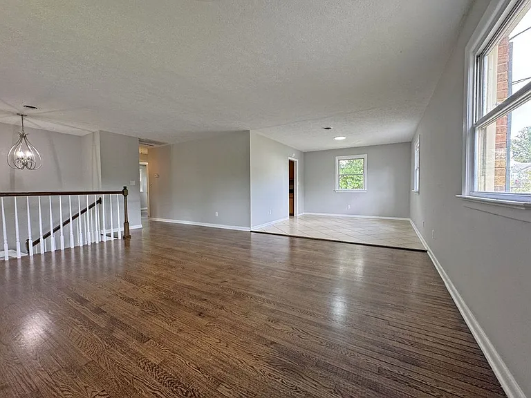 Open Floor Plan between Beautiful Living Room and Dining Room