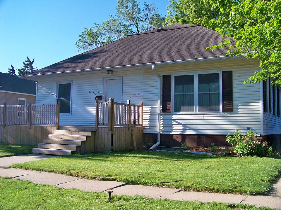 front of home, has a large deck