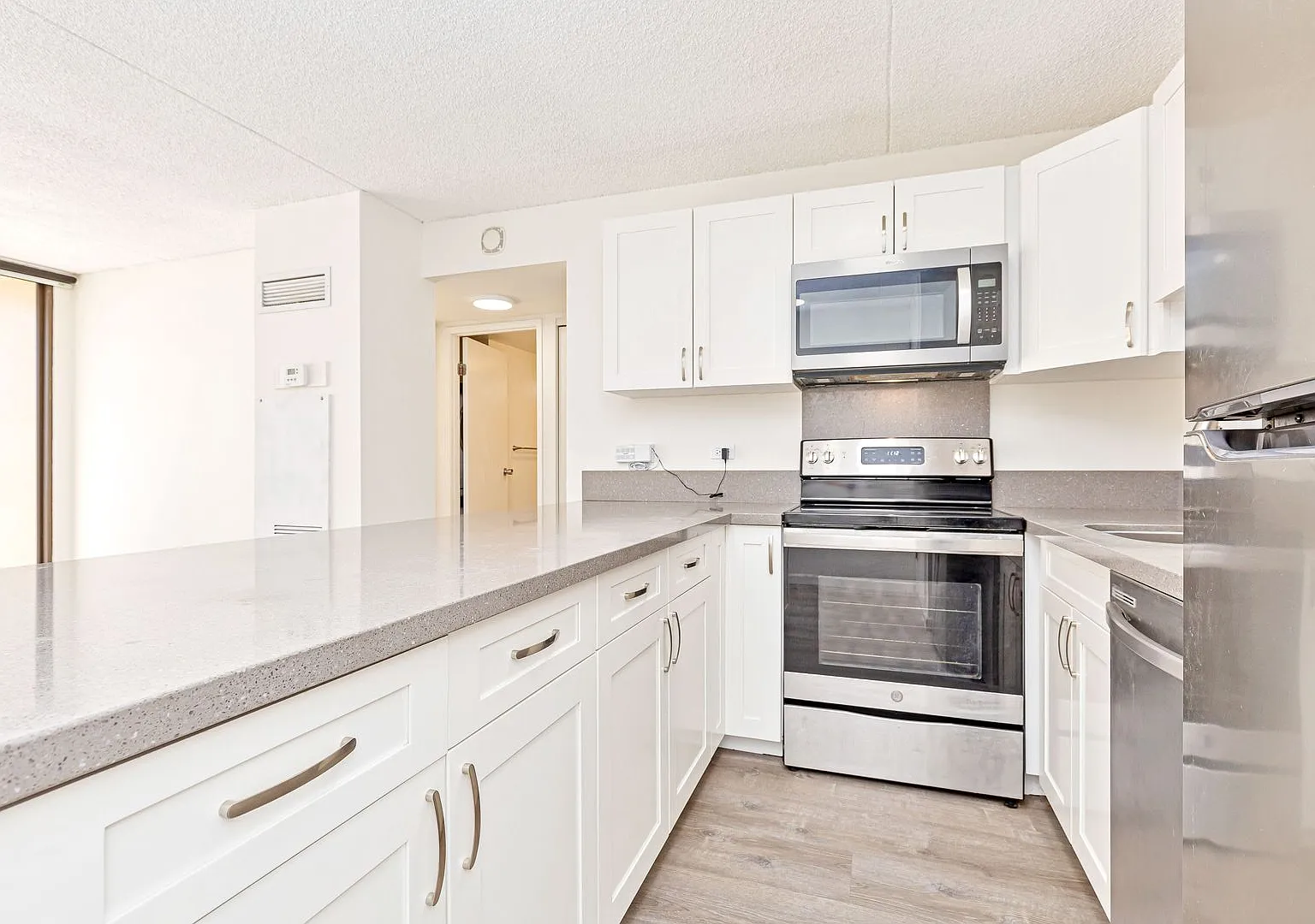 Rare Find! 2BR with Central AC + Electricity Included & Parking — Photo 1