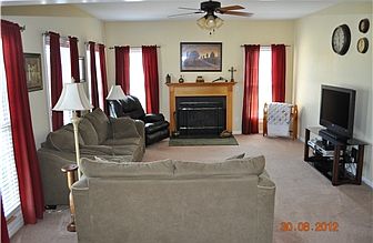 Family room w/wood burning fireplace
