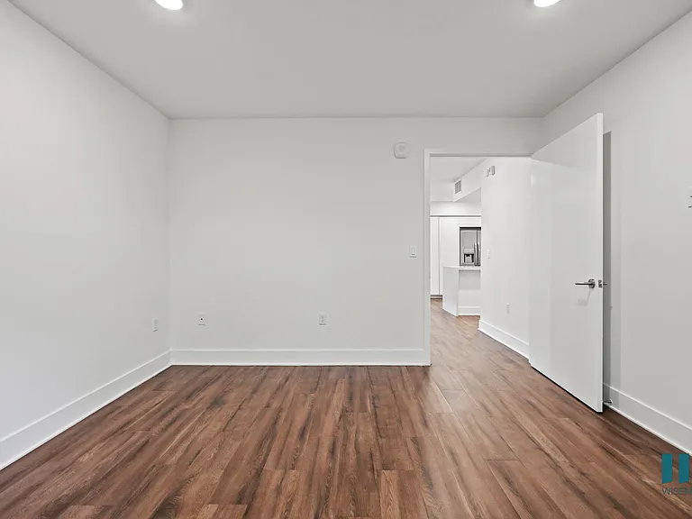 Bedroom with Vinyl Flooring and Recessed Lighting