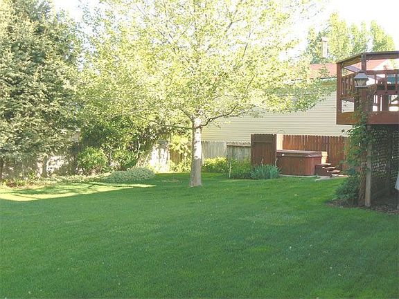 private back yard with hot tub
