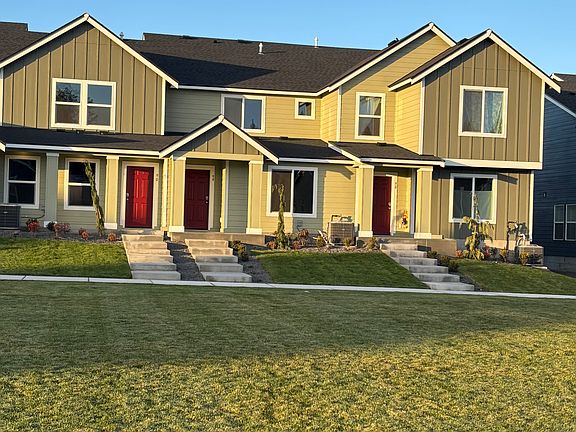 Green space in front of townhouse.