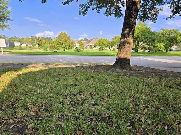 Front Lawn has a great view of the pond.