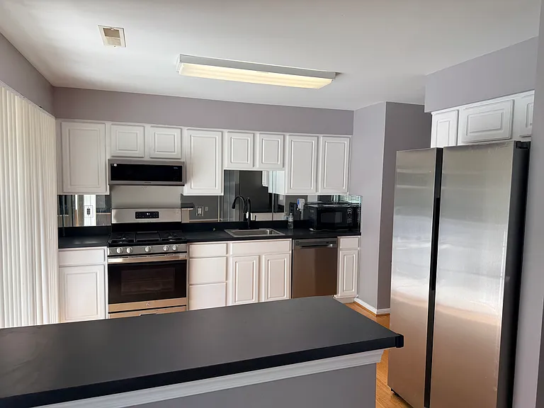 Kitchen - Brand new Stainless Steel Appliences (Gas Range, Microwave, Dish Washer & Refridgerator)