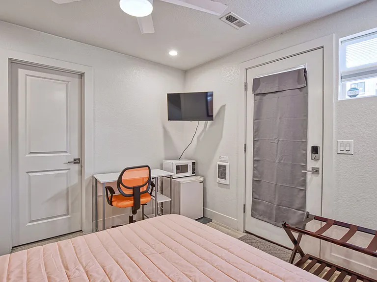 First floor bedroom with ensuite bathroom, closet and private entrance