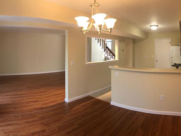 Dining Room and Kitchen. Living Room beyond