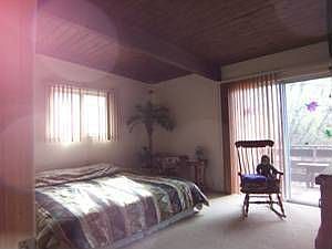 Spacious master bedroom with walk-out to deck. 