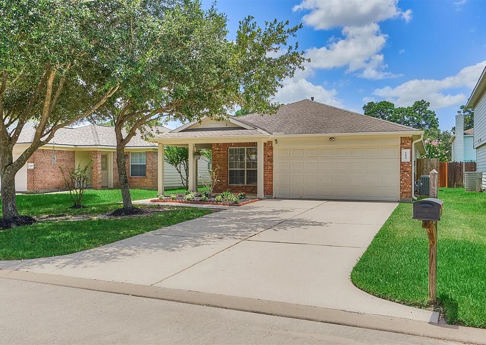 2-Car Garage and Spacious Double. Driveway. Auto Garage Door Opener.