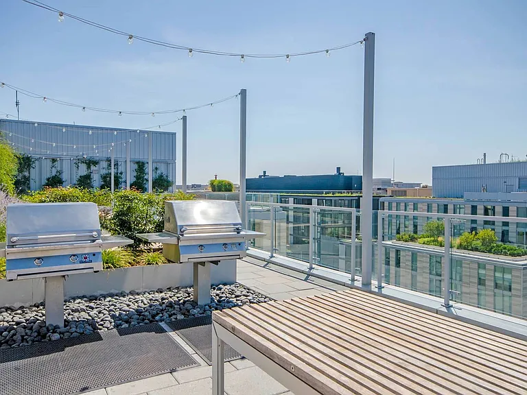 Skyline views, warm sun, and something sizzling on the grill.