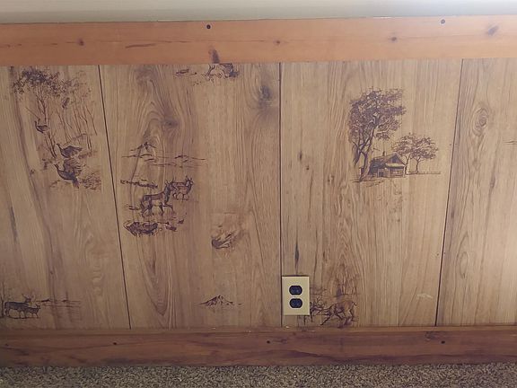 The rustic paneling in the living room!