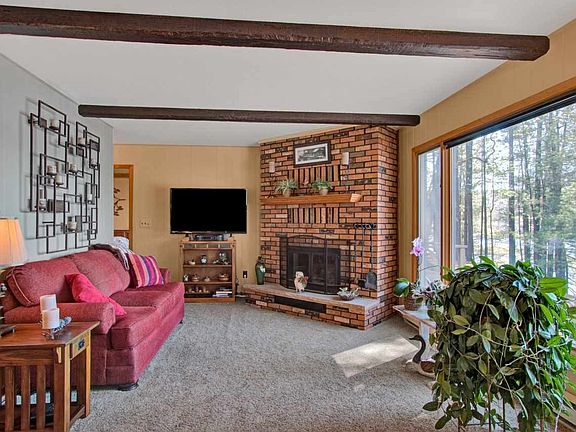 Living Room w/Wood Burning Fireplace