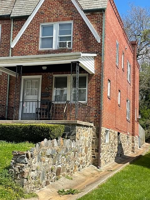 end of unit townhouse with off street parking. wooded back yard