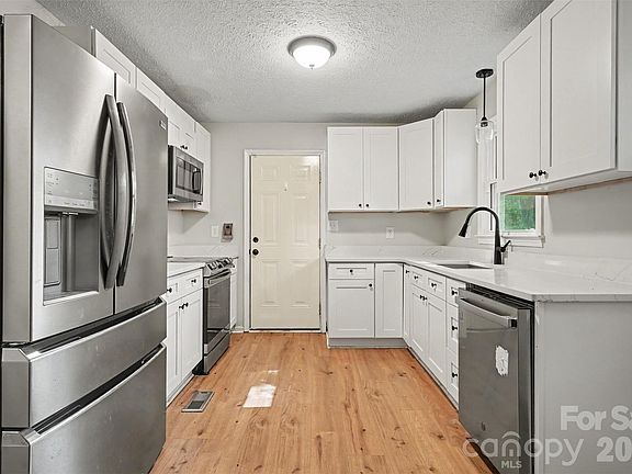 3rd image of 1328 Newton St