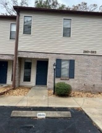 Front door & parking (2) to unit 2805