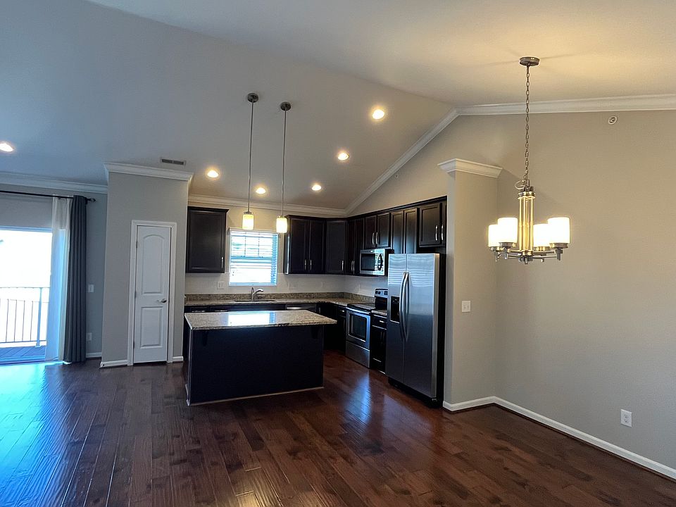 Kitchen, dining area and balcony