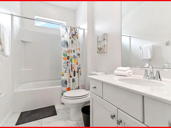 The bedroom connects directly to a full private bathroom for added convenience.