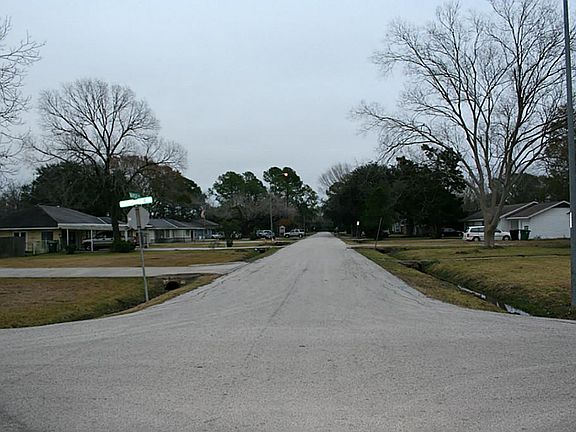 Looking the other way on Maple with lot behind