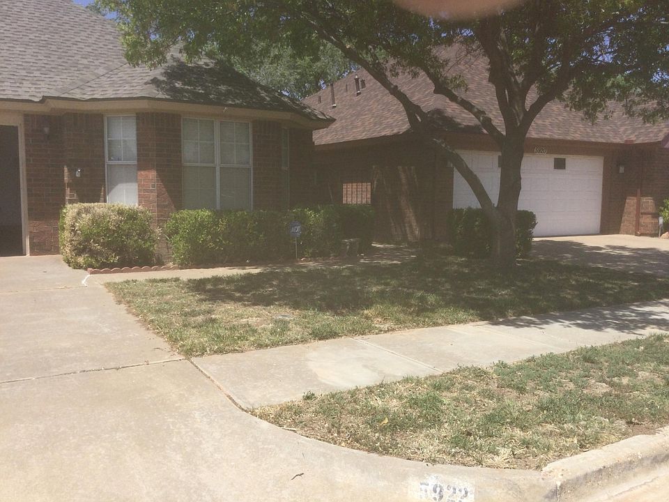 Front of house with double car garage.