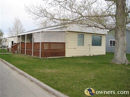View from street intersection. Garage is at rear.