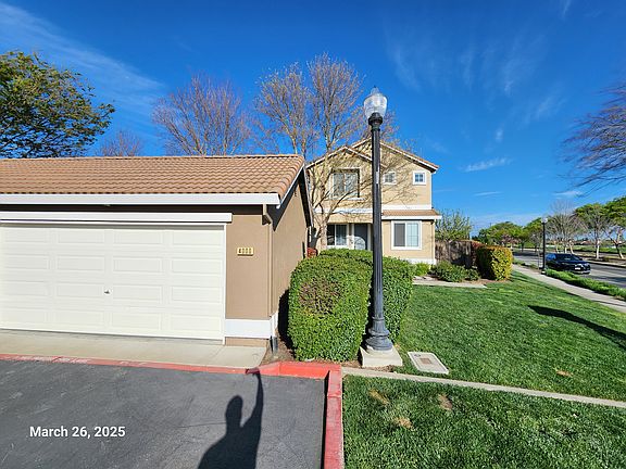 Front photo with 2 car garage
