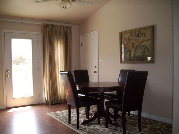 dining area with french doors to the backyard
