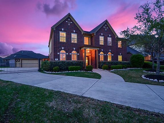 Well after twilight, the welcoming glow from within this 5-6 bedroom, 3.5 bathroom home beckons you inside. Enjoy the amenities of an upscale community and the serenity of suburban living.