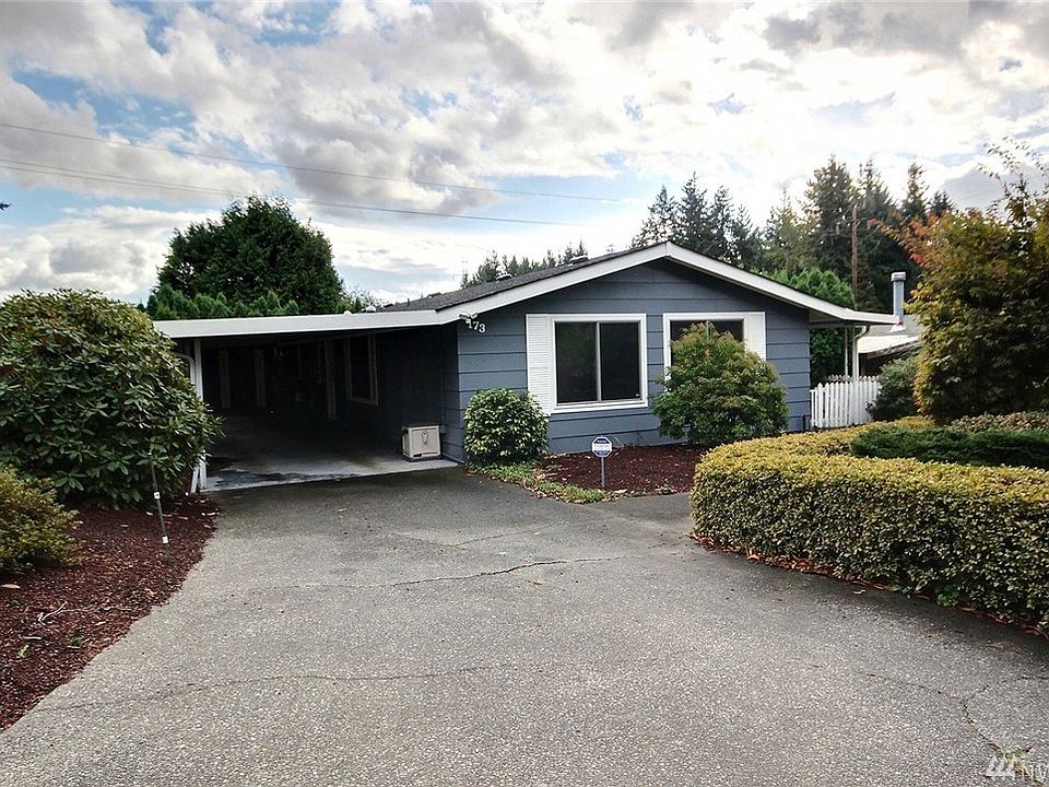 One of the largest and most private lots in Leisure Estates--a 55+ community that offers golf, a clubhouse, a pool, sauna, hot tub, tennis courts, a gated entry and RV parking!  This home has fresh exterior paint on the siding and trim, new foundation vents that open and close, a furnace and heat pump that were installed in October of 2017 (the heat pump supplements the furnace making it more energy efficient and also provides central air conditioning), a full master bathroom remodel in 2018, new LED exterior motion detectors, a sprinkler system, new shut off values, updated Pex plumbing and a new hot water heater in 2015!  