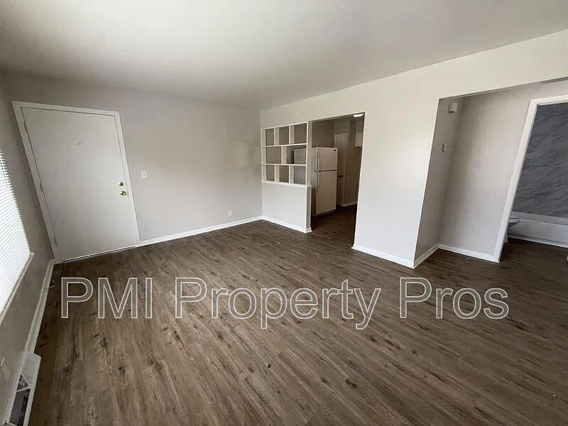 Building Photo - 7701 W Hampton Ave #1