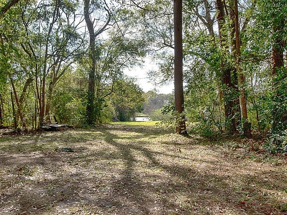 Beautiful trees line the lot giving you wonderful privacy between your neighbors.