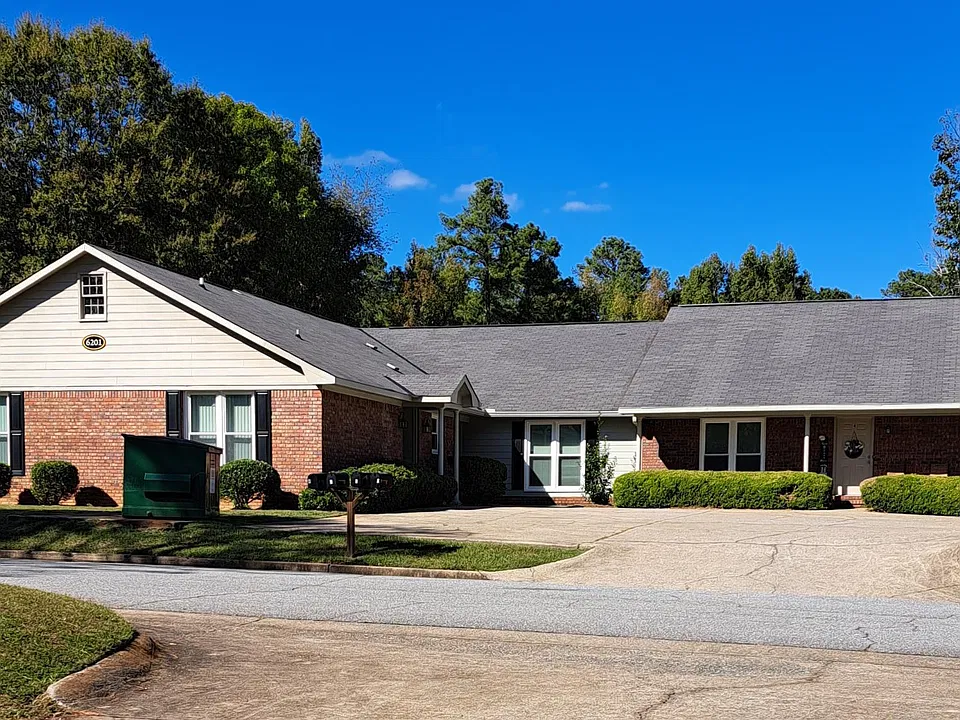 1 story all brick with large parking area for the 4 apartments