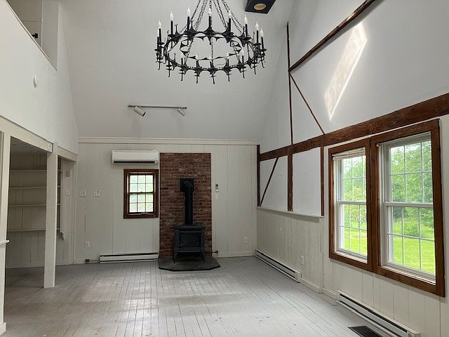 Cozy gas stove fireplace with beautiful chandelier