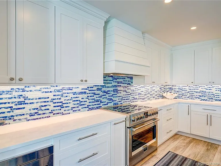 5799 NE Island Cove Way #1104 — Photo 24