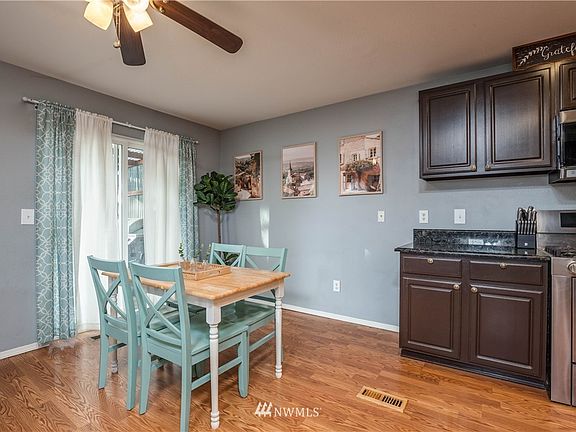 Dining room has slider to back deck