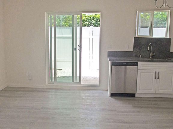 living room area with sliding glass doors to patio