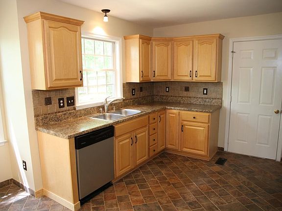 Sunny kitchen with tile floor
