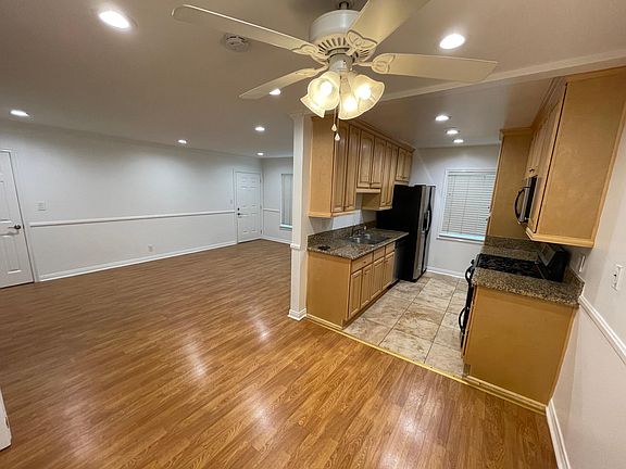 View of Front Door/Living Room and Kitchen