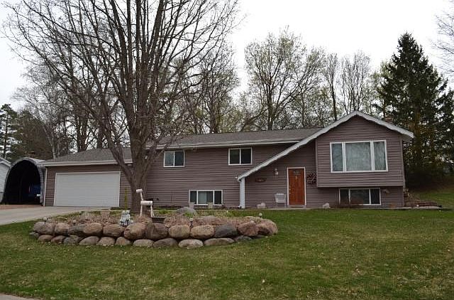 Come home to a quiet street, concrete driveway and exposed aggregate sidewalk leading to the front door! Extra space on the side of the garage allows for a boat or an RV! Updates include roof, siding, windows, heat and central air!