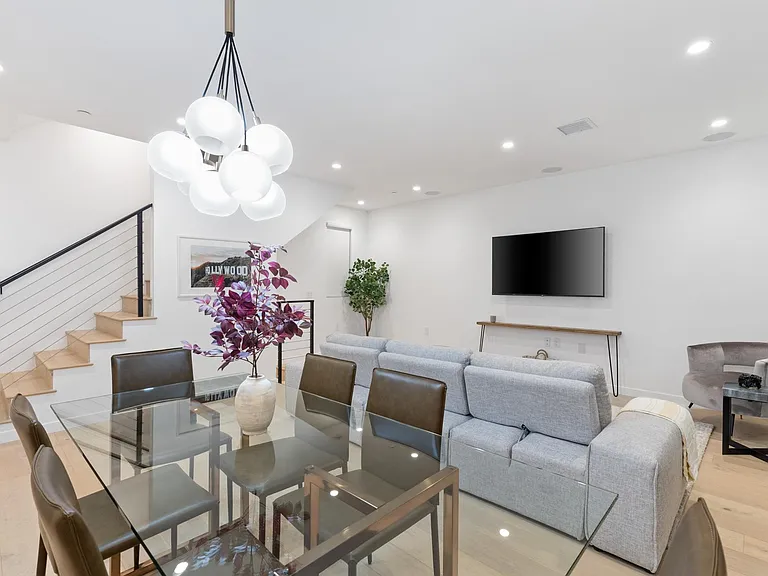 Take a seat at the 6-person Dining Space, with additional 3 counter bar stools