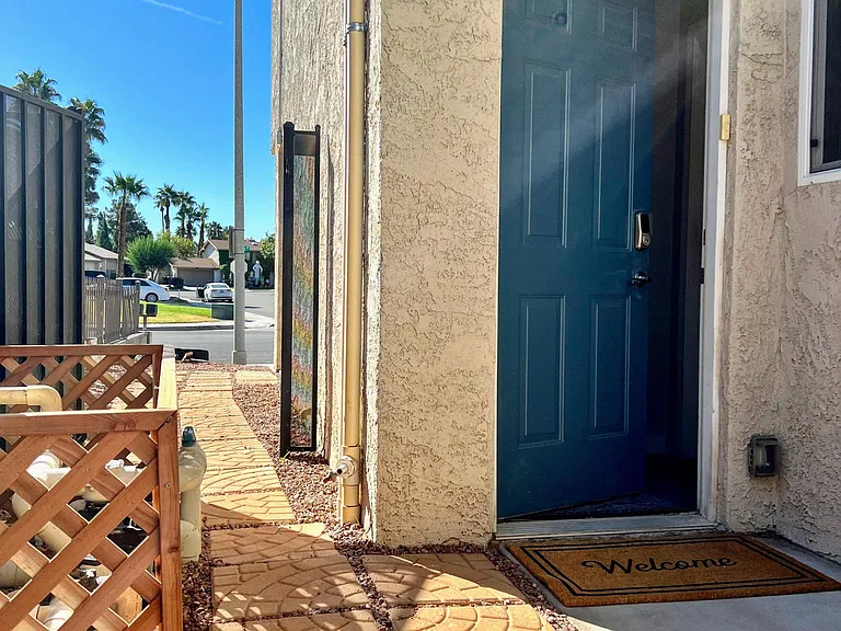 Your Own Private Exterior Access Front Door! Please note the pool equipment & black gate have been removed.