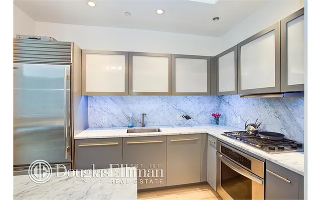 Sold by Douglas Elliman | media 13