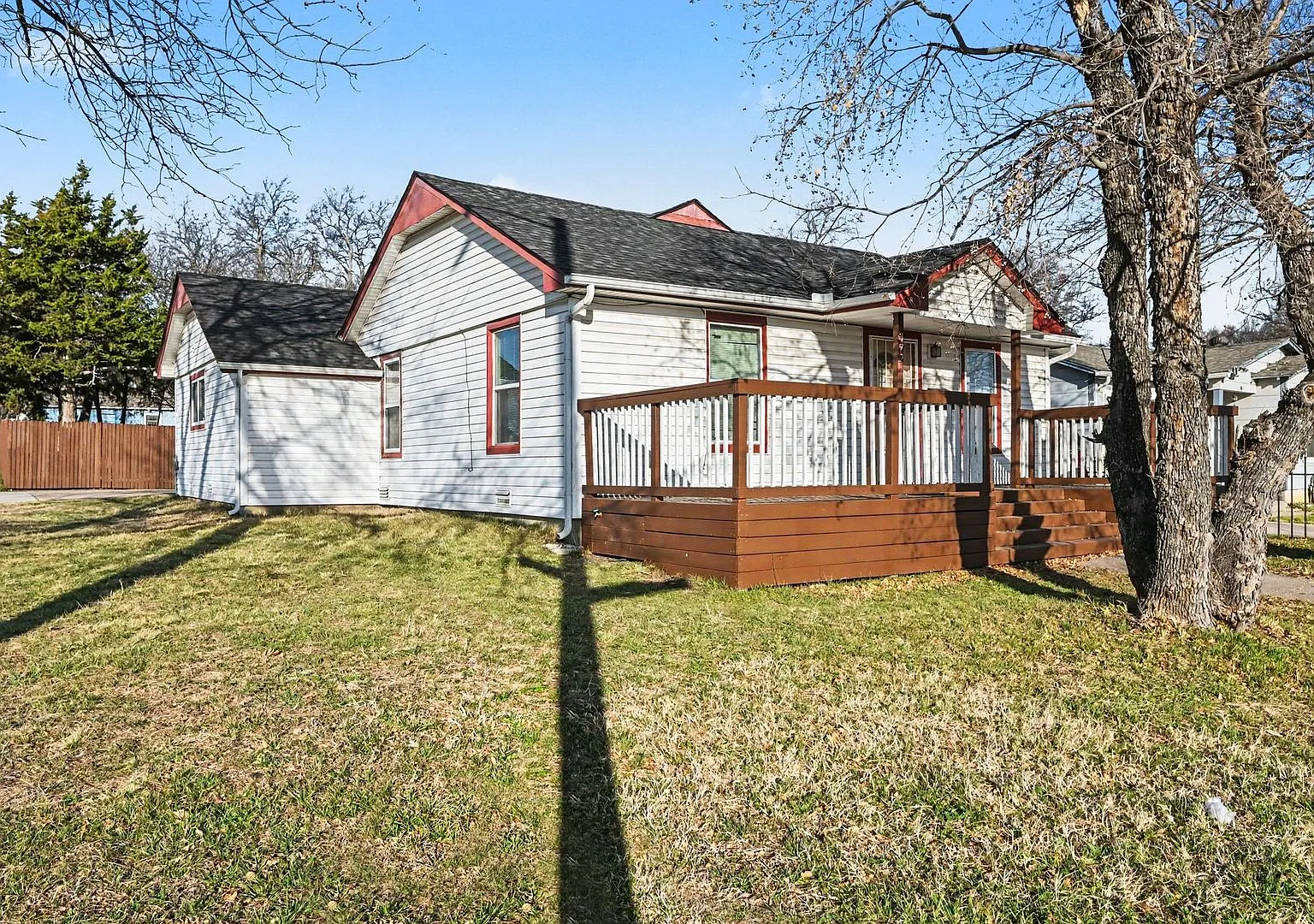 Functional Floorplan with Spacious Yard and Storage Shed — Photo 2