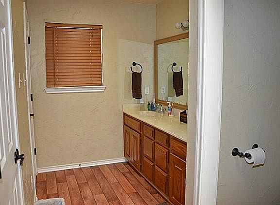 Master Bath has 2 huge Walk In Closets & Separate Sinks