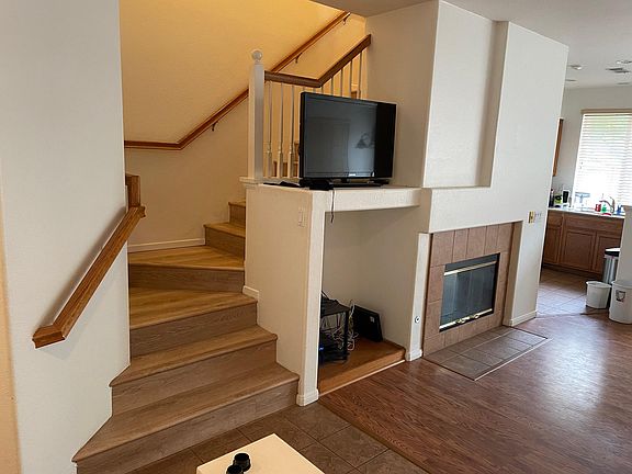 from main entrance towards 2nd floor and living room to the right