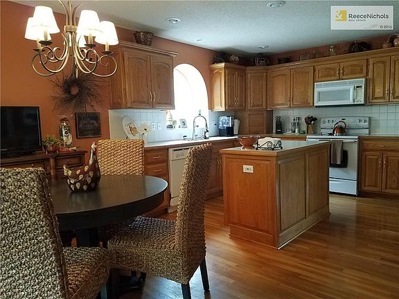 Sunlit eat-in kitchen.  All appliances stay!