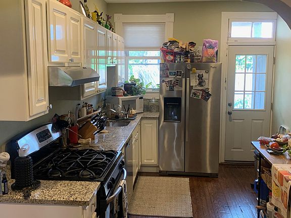 New modern kitchen, with new wood cabinets and stainless steel appliances.