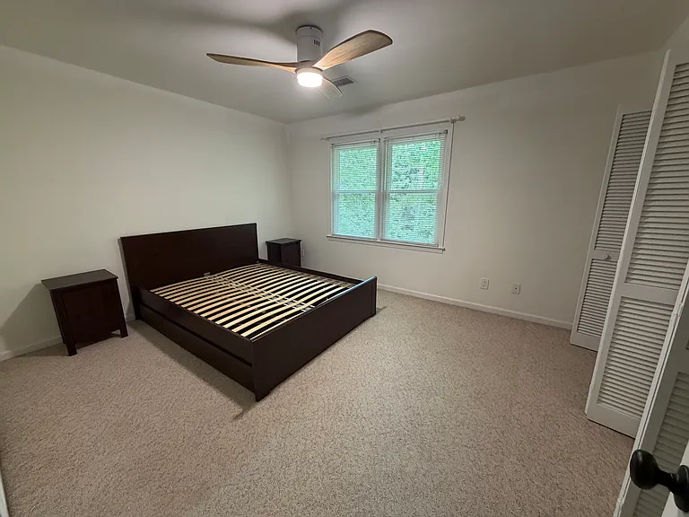 Back Bedroom (tenant can use this bed and these two nightstands or we can remove them.)