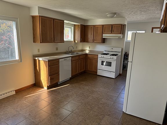 Kitchen w Large Window in Dining Area