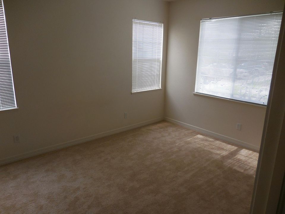 master bedroom. Curtains not shown but included.