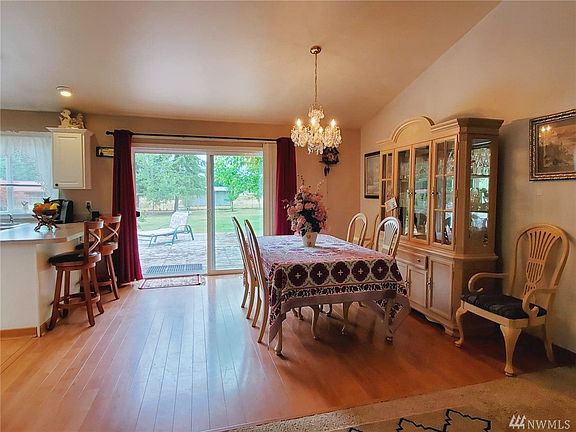 Spacious Dining Room flows into the kitchen with Breakfast Bar